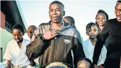  ?? Picture: ZIYANDA ZWENI ?? CHAMPION: World Fighting Kyokushin Organizati­on champ Anele Madlala is welcomed at the the Mthatha Airport.