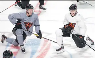  ?? THE CANADIAN PRESS ?? Team North America forwards Connor McDavid, left, and Nathan MacKinnon practised on a line together ahead of Wednesday’s pre-tournament World Cup of Hockey game against the Czech Republic.