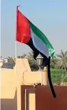  ??  ?? The UAE flag hoisted on the rooftop of an Emirati house.