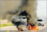  ??  ?? PROTEST CHAOS: A scene from northern areas protest action in Stanford Road, Helenvale, in July 2015. On Friday, May 5, and again on Monday, the road was again the centre of protest action