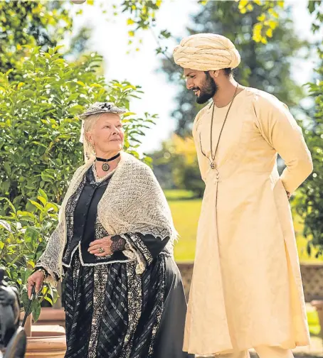  ??  ?? Dame Judi Dench and Bollywood star Ali Fazal star in Victoria & Abdul.