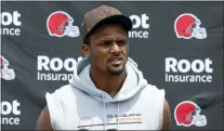  ?? RON SCHWANE — THE ASSOCIATED PRESS ?? Browns quarterbac­k Deshaun Watson answers a question at the team’s practice facility on Tuesday in Berea, Ohio.