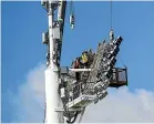  ?? ?? Yarrow Stadium lights being worked on last month.