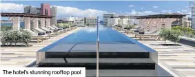  ??  ?? The hotel’s stunning rooftop pool