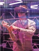  ?? AMY OSBORNE/AFP/GETTY IMAGES ?? An attendee tries out the new Oculus Quest Virtual Reality gaming system Tuesday at the Facebook F8 Conference at McEnery Convention Center in San Jose, Calif.