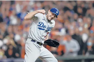  ?? JOHN HEFTI/AP ?? Dodgers pitcher Max Scherzer celebrates after defeating the Giants in Game 5 of the NLDS on Oct. 14 in San Francisco.