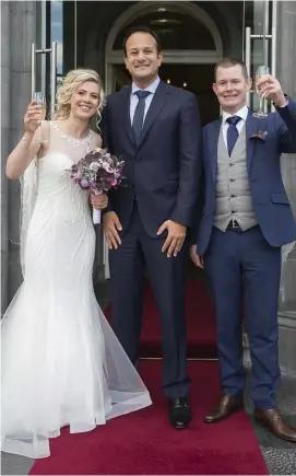  ??  ?? Taoiseach Leo Varadkar meets with newly-weds Ian and Eleanor Walsh from Kilmacow, Co Kilkenny on the final day of the Fine Gael think-in at the Minella Hotel, Clonmel, Co Tipperary. Photo: Mark Condren