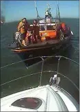  ??  ?? Wicklow RNLI assisting a stricken cruiser on Sunday.