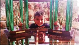  ?? SUBMITTED PHOTO ?? JJ Habres, 8 years old, with his 2016 and 2017 World Pinewood Derby first place