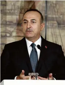  ?? Turkish Foreign Ministry/Fatih Aktas/AFP ?? Mevlut Cavusoglu, 51 Ministro das Relações Exteriores da Turquia, é um dos fundadores do Partido Justiça e Desenvolvi­mento (AKP, na sigla em turco)