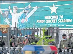  ?? AFP ?? Policemen stand guard outside the Rawalpindi Cricket Stadium in Rawalpindi on Friday.