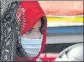  ?? DHEERAJ DHAWAN/HT PHOTO ?? A woman wearing mask to protect herself from Covid-19 infection in Old City area of Lucknow on Friday.