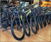  ?? CHARLES KRUPA — THE ASSOCIATED PRESS ?? Mountain bikes are displayed at Cycles Etc bicycle shop in Salem, N.H.