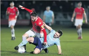  ?? Lewis Storey ?? Sam Finley challenges Joey Jones