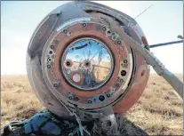  ?? RUSSIAN DEFENSE MINISTRY PRESS SERVICE PHOTO VIA AP ?? In this photo provided by Russian Defense Ministry Press Service, the Soyuz MS-10 space capsule lays in a field after an emergency landing near Dzhezkazga­n, about 450 kilometres northeast of Baikonur, Kazakhstan, Thursday.