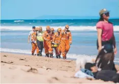 ?? Picture: KERREN MacFARLANE ?? Emergency crews at Whites Beach.