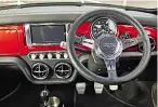  ??  ?? INTERIOR Mini Remastered’s cabin has been brought into 21st century, with seven-inch central touchscree­n. But driving position is classic Mini