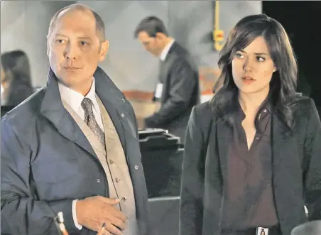  ??  ?? FACE TIME: James Spader (left) and Megan Boone star in NBC’s Monday-night drama, “The Blacklist.”