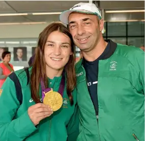  ??  ?? KNOCKOUT .... Searingly honest documentar­y shows the vulnerable side to World Champion boxer and Olympian Katie Taylor (far left) with mum Bridget and (above) winning Olympic gold in 2012 with dad Pete