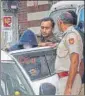  ?? PTI ?? Aaftab Ameen Poonawala being brought to his Chhatarpur residence on November 20.