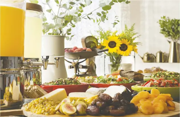  ?? ORI ACKERMAN ?? Delicious spreads tempt tastebuds across Israel. Dried fruit, cheeses and fresh salads were among the highlights of the breakfast buffet at Shtarkman Erna Hotel in Nahariya.