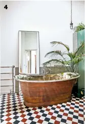  ??  ?? 4 BATHROOM
The plant softens the bolder pieces. Babylon bath, from £5,508; Quarry floor tiles, £47.04sq m; Toledo wall tiles, £74.76sq m, all Fired Earth