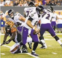  ?? FRANK VICTORES/ASSOCIATED PRESS ?? After one of the best starts of his career in Week 1, Ravens quarterbac­k Joe Flacco threw two intercepti­ons against the Bengals.