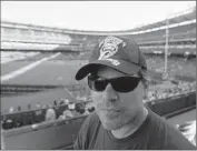  ?? Luis Sinco
Los Angeles Times ?? CHUCK BOOTH, seen at Angel Stadium, is on a jaunt of more than 200 games at major league parks.