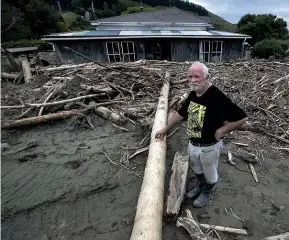  ?? MONIQUE FORD/STUFF ?? Slash and silt two metres deep outside the Esk Valley house of Steve Wheeler in Hawke’s Bay. Forestry has faced a backlash since Cyclone Gabrielle.