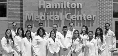  ?? Hamilton Medical Center ?? New internal and family medicine residents for Hamilton Medical Center take part in a recent white coat ceremony.