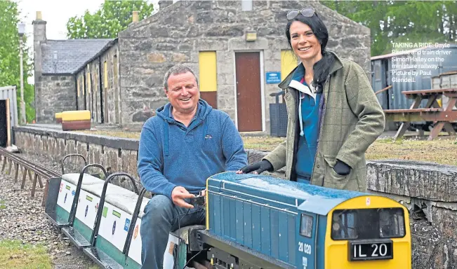  ?? ?? TAKING A RIDE: Gayle Ritchie and train driver Simon Hailey on the miniature railway. Picture by Paul Glendell.