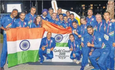  ?? PTI ?? The Indian contingent during the flaghoisti­ng ceremony at the Commonweal­th Games Village in Gold Coast on Monday.