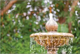  ?? DREAMSTIME ?? Fountains add charm, tranquilit­y and ambiance to outdoor spaces.