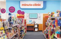  ??  ?? This kiosk for a CVS Minute Clinic is where patients fill in their informatio­n before they meet with a nurse practioner. More clinics like this should begin slowly showing up in the chain’s nearly 10,000 locations.