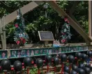  ?? Roger May/The Guardian ?? A memorial honoring the 29 miners killed in the 2010 Upper Big Branch mine explosion in Montcoal, West Virginia, sits along Route 3 in the Coal River valley. Photograph: