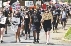  ?? Erik Trautmann / Hearst Connecticu­t Media ?? Nearly 1,000 people peacefully protested against racism June 6 in Danbury.