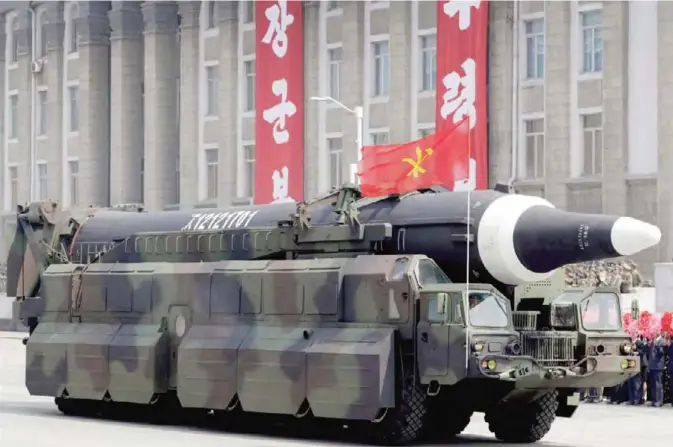  ??  ?? PYONGYANG: In this April 15, 2017, file photo, a missile that analysts believe could be the North Korean Hwasong-12 is paraded across Kim Il Sung Square. — AP