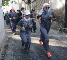  ?? AFP ?? Saudi women jog in the streets of Jeddah