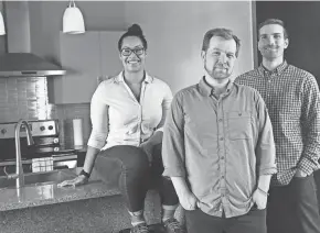  ??  ?? Frontdesk COO Alycia Doxon (from left), CEO Kyle Weatherly and CTO Jesse DePinto sit in one of the company's rental units in the Mackie Building on East Michigan Street in Milwaukee. The corporate housing startup has 75 units in Milwaukee, Indianapol­is and Charlotte, N.C.