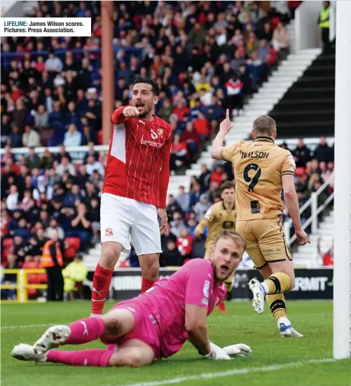  ?? James Wilson scores. Pictures: Press Associatio­n. ?? LIFELINE: