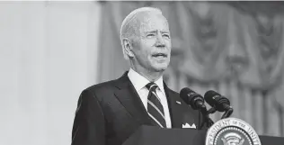  ?? Susan Walsh / Associated Press ?? Starting next month, President Joe Biden’s administra­tion will begin erasing student debt for 323,000 Americans identified as permanentl­y disabled.