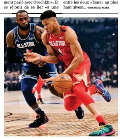  ?? –AFP ?? Giannis Antetokoun­mpo (Milwaukee, en rouge), ici lors du All-star Game face à Lebron James.