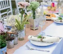  ?? 123RF.COM ?? For a backyard wedding, you can’t go wrong with a burlap table runner and plants of different kinds.