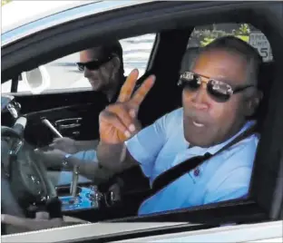  ?? Ron Kantowski ?? Las Vegas Review-journal O.J. Simpson is spotted driving a white sport utility vehicle Tuesday in Las Vegas.