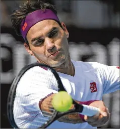  ?? ANDY BROWNBILL / AP ?? Roger Federer staved off seven match points in a 6-3, 2-6, 2-6, 7-6 (8), 6-3 quarterfin­al win over Tennys Sandgren in the Australian Open.