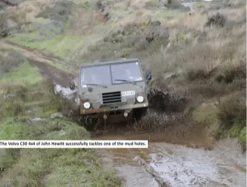  ??  ?? The Volvo C30 4x4 of John Hewitt successful­ly tackles one of the mud holes.