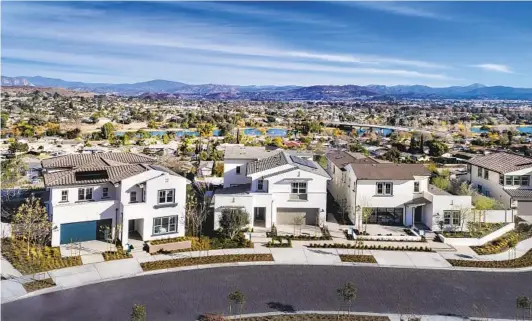  ?? COURTESY PHOTO ?? Boasting views of East County’s scenic hillsides, Lake Ridge at Weston offers homes of three to six bedrooms, up to 4.5 bathrooms and large two-bay garages.