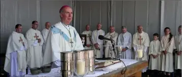  ??  ?? Bishop Denis Brennan saying Mass at Our Lady’s Island.