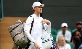 ?? Wimbledon. Photograph: Clive Brunskill/Getty Images ?? Jannik Sinner broke grand slam rules when he carried a Gucci bag on court with him at