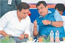  ?? — DC ?? Union Minister Nitin Gadkari with municipal administra­tion and urban developmen­t minister K.T. Rama Rao in Hyderabad on Saturday.